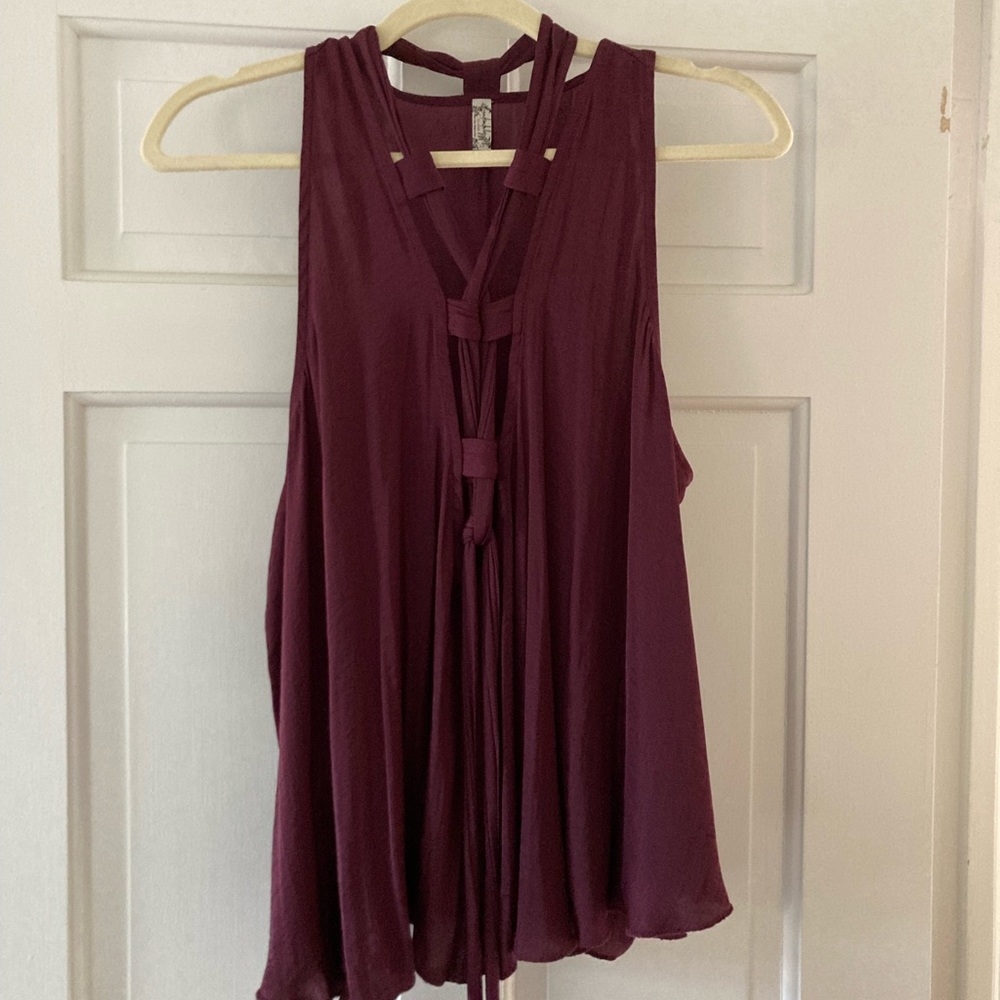 Beautiful deep violet Free People silky top with front- cross cross - size Small